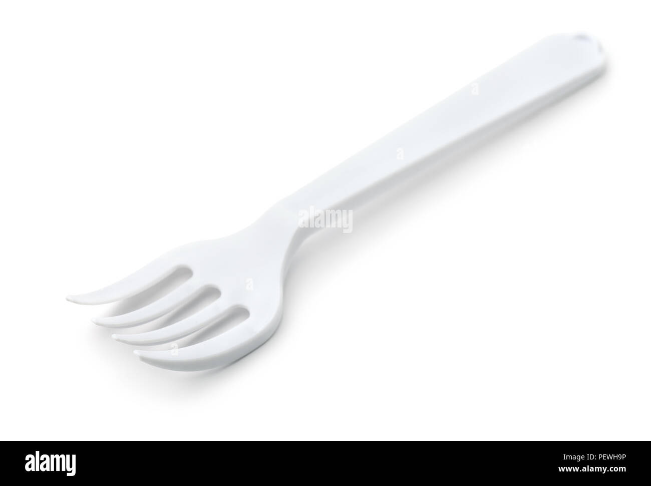 White plastic disposable fork isolated on white Stock Photo