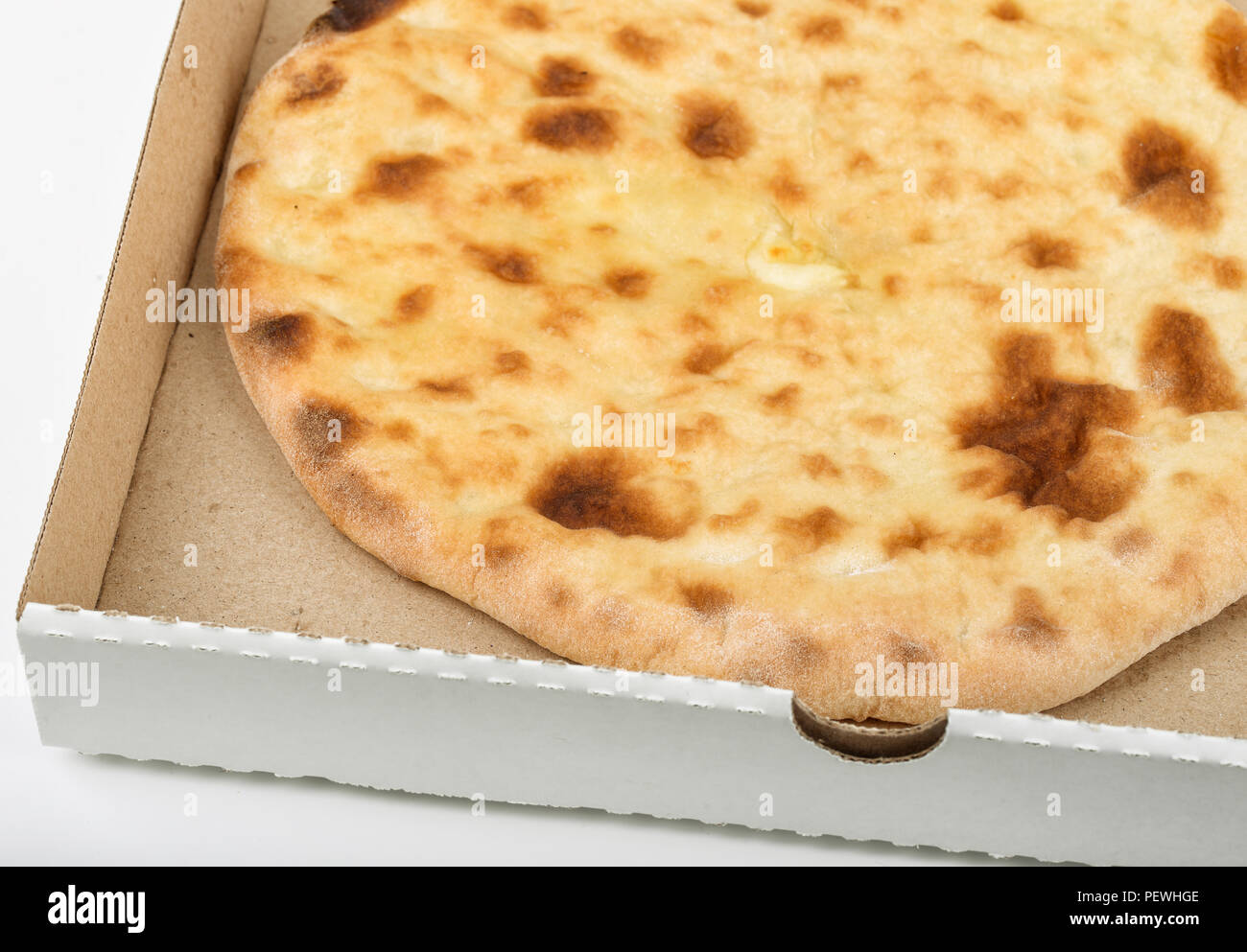 Close up of freshly baked flatbread in delivery box Stock Photo