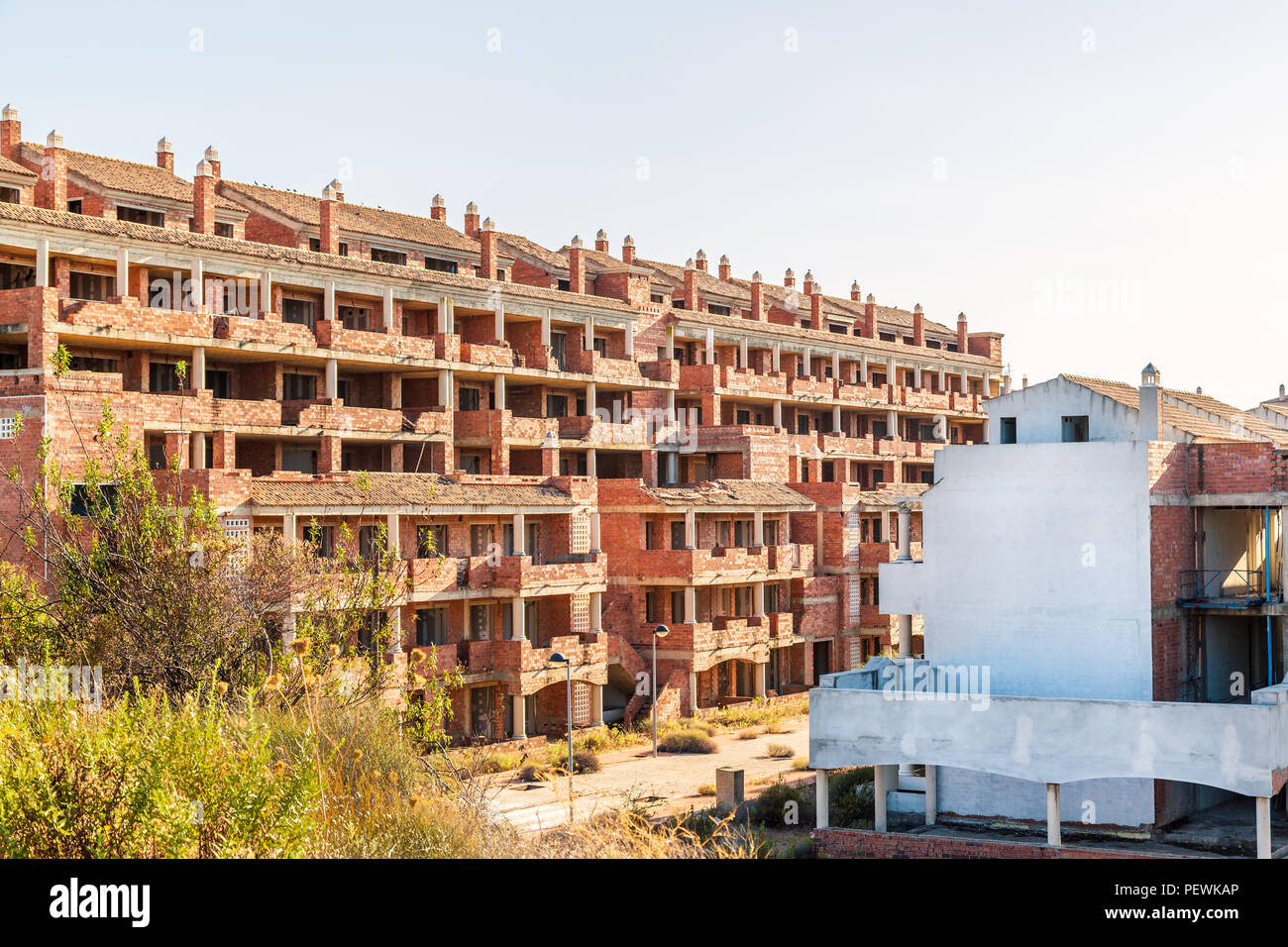 Unfinished residential buidlings in Andalucia Spain abandoned after the property bubble burst with the financial crash cerca 2007 Stock Photo
