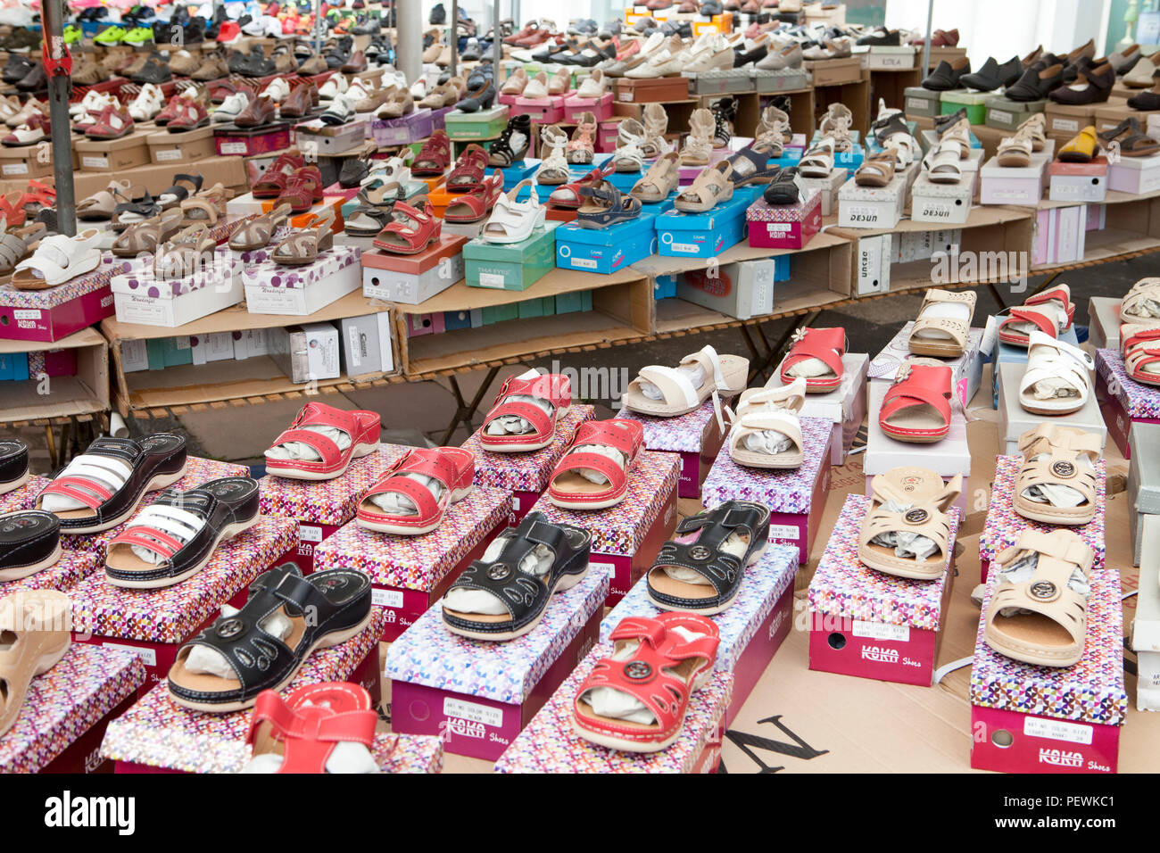 Market stand selling shoes, Germany, Europe Stock Photo