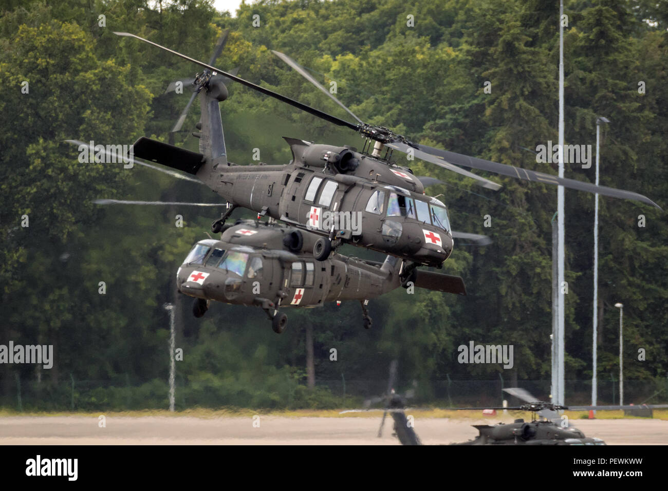 EINDHOVEN, THE NETHERLANDS - JUN 22, 2018: United States Army Sikorsky UH-60 Blackhawk transport helicopters taking off. Stock Photo