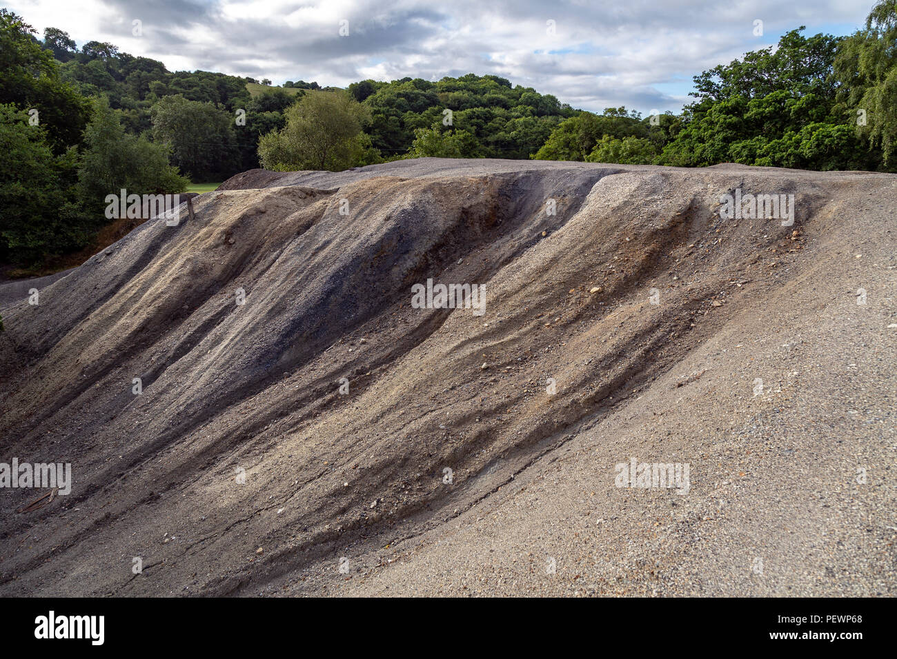 Spoil from Arsenic pit,teign valley,Wheal Exmouth, Christow, Teignbridge, Devon, England, UK,tips are composed of crushed local slate. Stock Photo