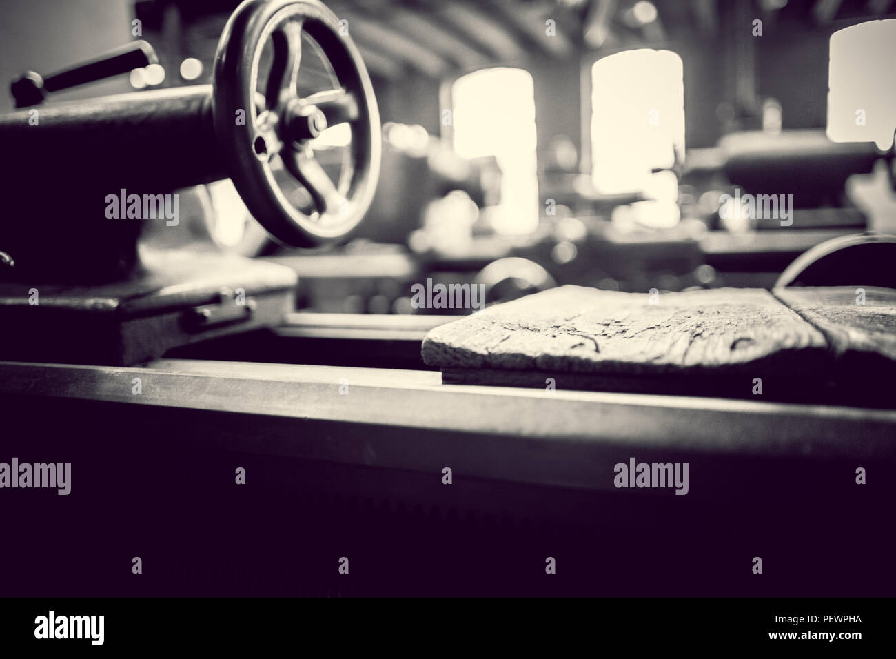 Old machine in an industry museum in germany in black and white. Fromer ...