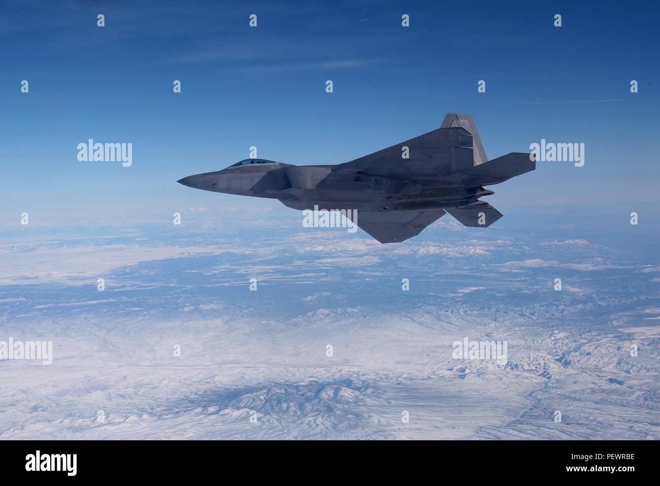An F-22 Raptor, a twin-engine stealth air superiority fighter powered ...