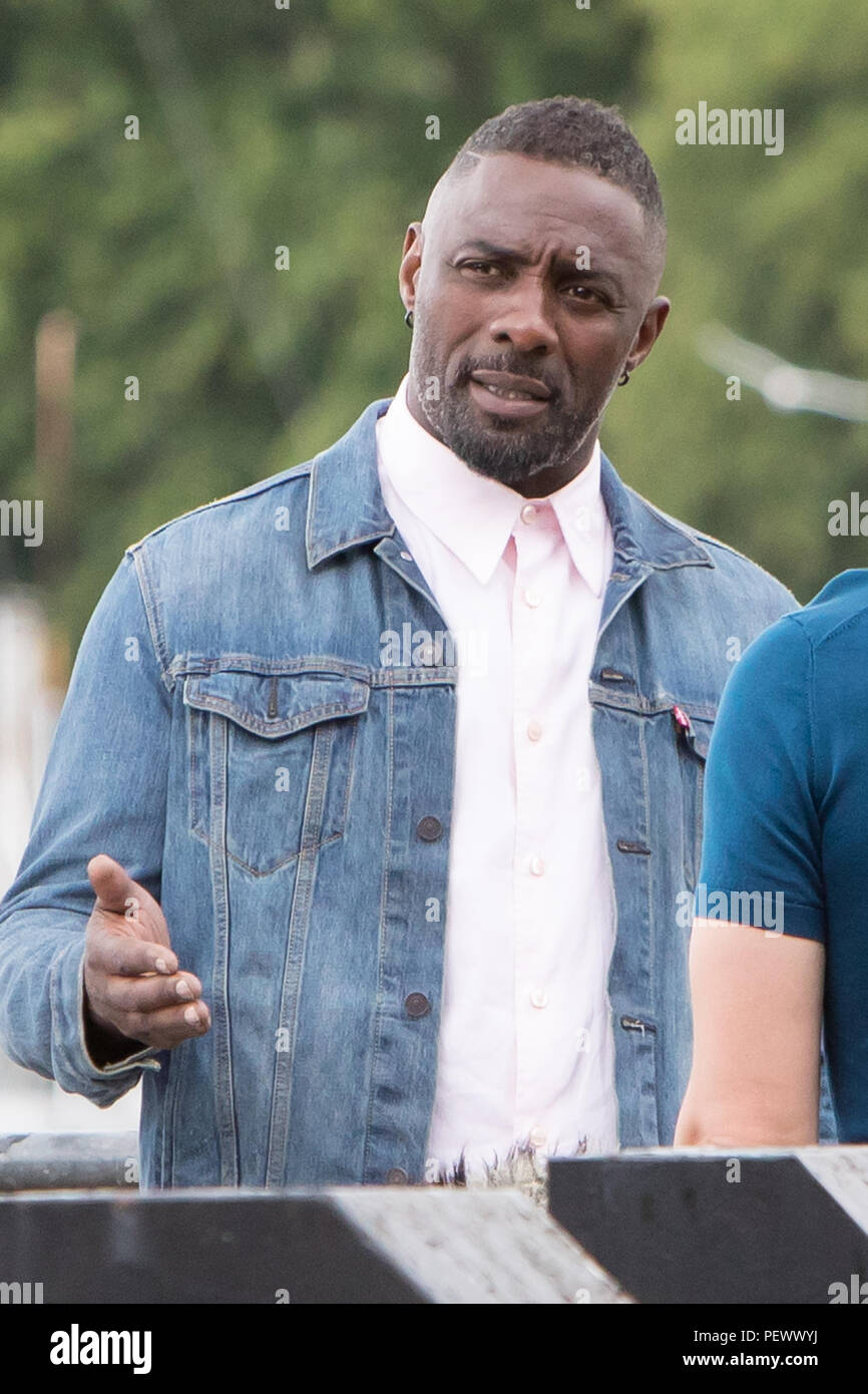 Idris elba looks smart whilst filming on the banks of the Thames ...