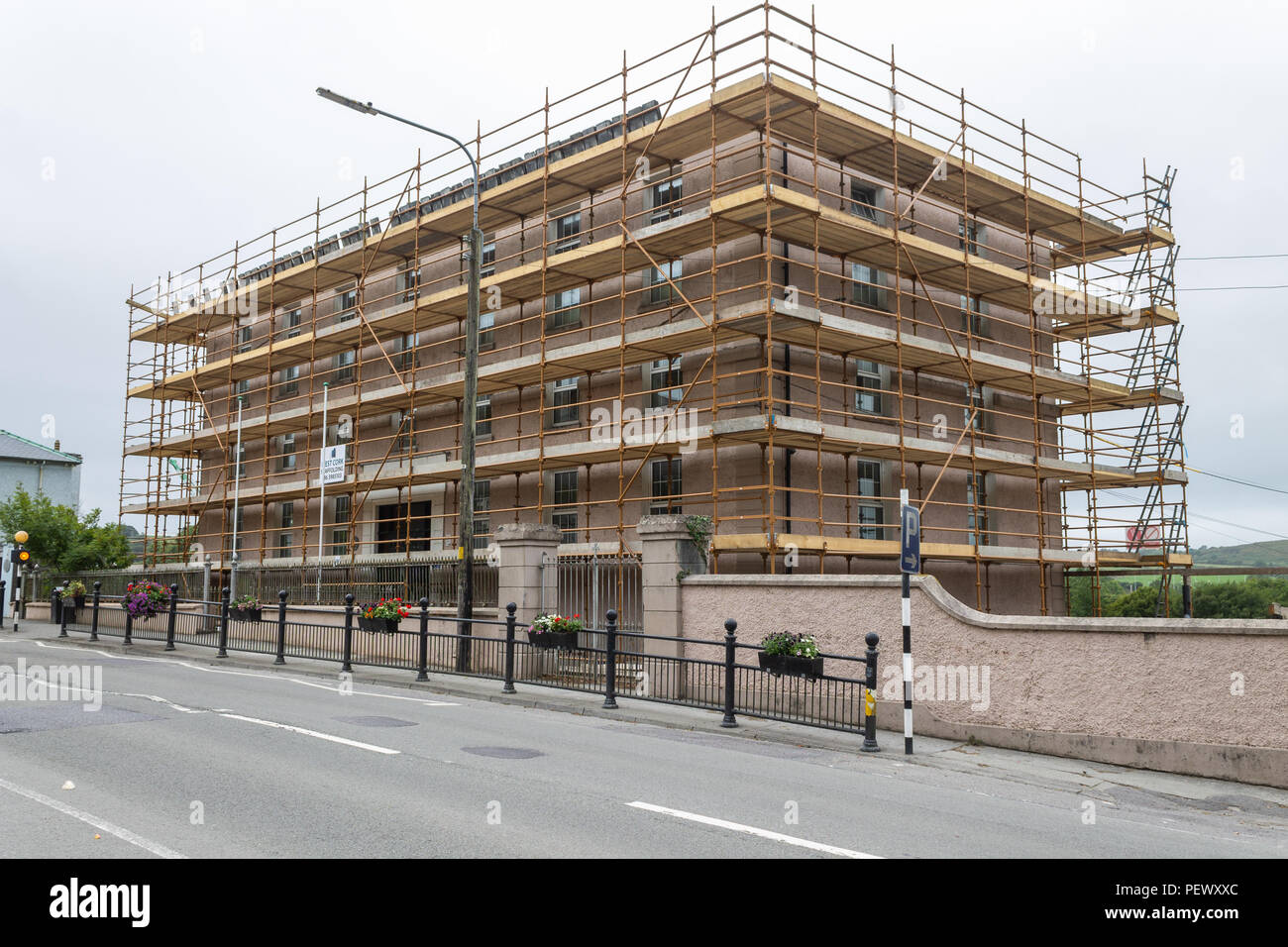 Old School building covered in Scaffolding, ireland Stock Photo Alamy