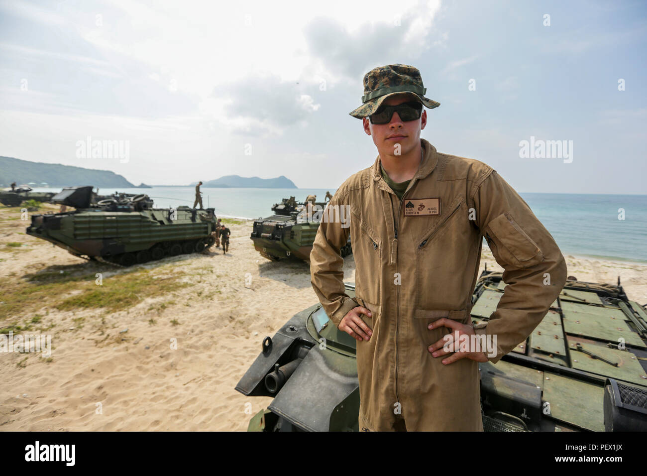 U.S. Marine Corps Cpl. Alex Evers, an assault amphibious vehicle crewman, with 3rd Assault Amphibious Battalion, a native of Cave Creek, Arizona, poses for a photo during an amphibious landing demonstration at Hat Yao, Rayong, Thailand, during exercise Cobra Gold, Feb. 12, 2016. Cobra Gold is a multinational training exercise developed to strengthen security and interoperability between the Kingdom of Thailand, the U.S. and other participating nations. (U.S. Marine Corps Combat Camera photo by Lance Cpl. Eryn L. Edelman/Released) Stock Photo