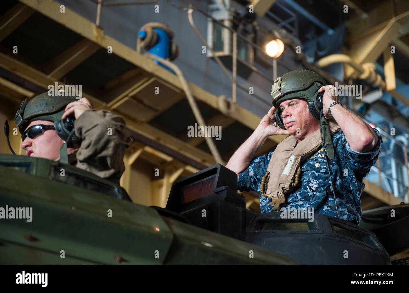 Rear Admiral John B. Nowell, commander of Task Force 76, and Marines ...