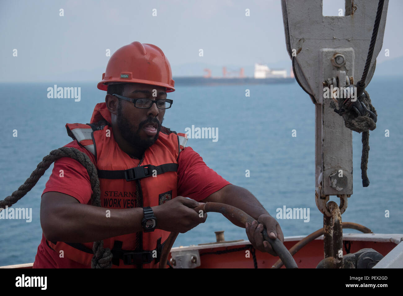 160213-N-OU129-093 GULF OF THAILAND (Feb. 13, 2016) Able-Body Seaman Bryan Howell participates in lifeboat deployment training during an abandon ship drill aboard USNS 1st LT Jack Lummus (T-AK 3011) while anchored in the Gulf of Thailand Feb 13. Lummus is a Military Sealift Command Marine Prepositioning Force ship supporting Exercise Cobra Gold 2016. U.S. Navy photo by Mass Communication Specialist 3rd Class Joshua Fulton/Released Stock Photo