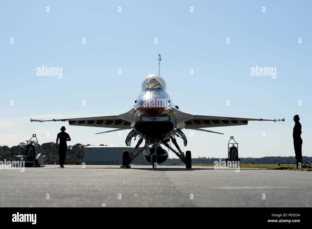Tactical aircraft maintenance technicians perform pre-flight ...