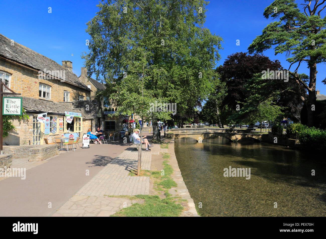 Summer, Bridges over the River Windrush, Bourton on the Water village, Gloucestershire, Cotswolds, England, UK Stock Photo