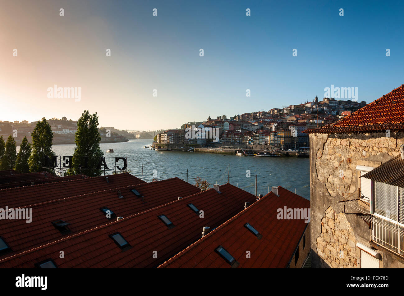 Porto, Portugal - October 4, 2010: View of the Ribeira Neighborhood and the Douro River with Rabelo Boats, in the city of Porto, Portugal Stock Photo