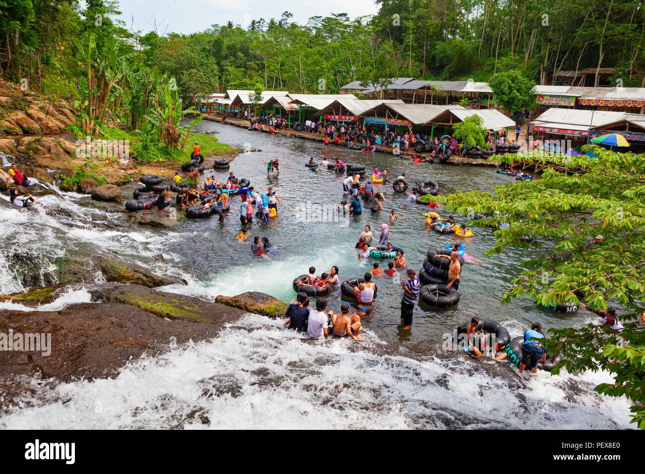 East Java, Indonesia - July 11, 2018: Sumber Maron - natural spring water spa with waterfall, swimming pools Popular place to visit for family holiday Stock Photo