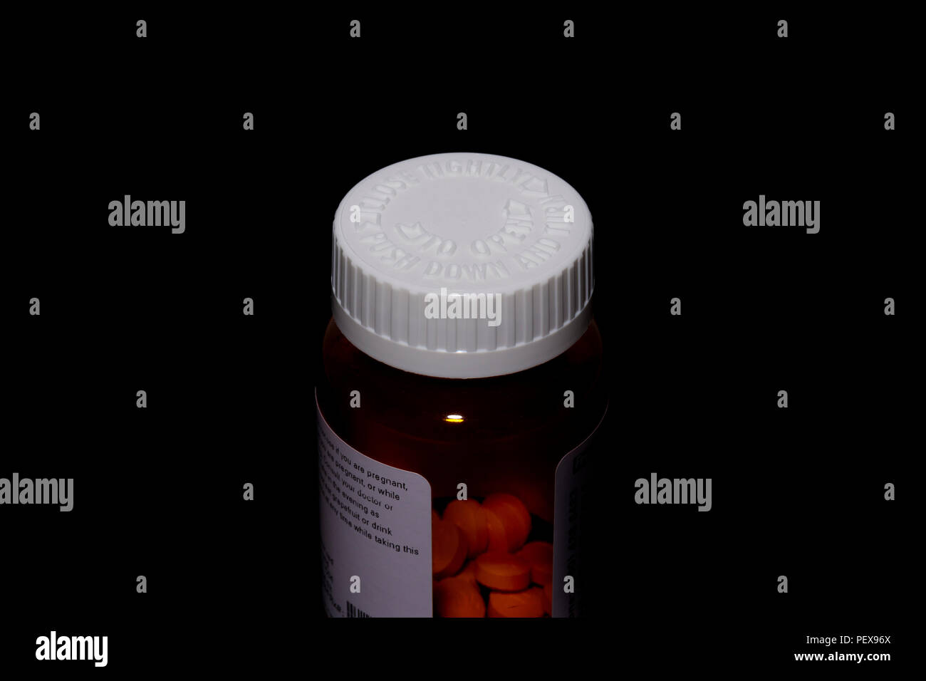 A Prescription Bottle With A Child proof Cap Stock Photo Alamy