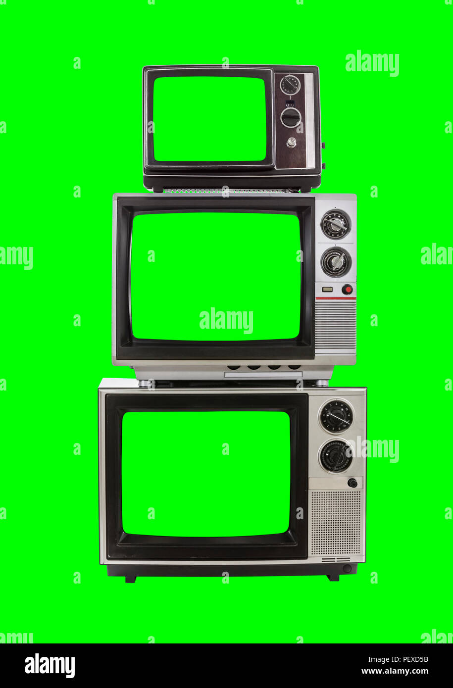 Vintage television tower isolated with chroma green background and screens. Stock Photo
