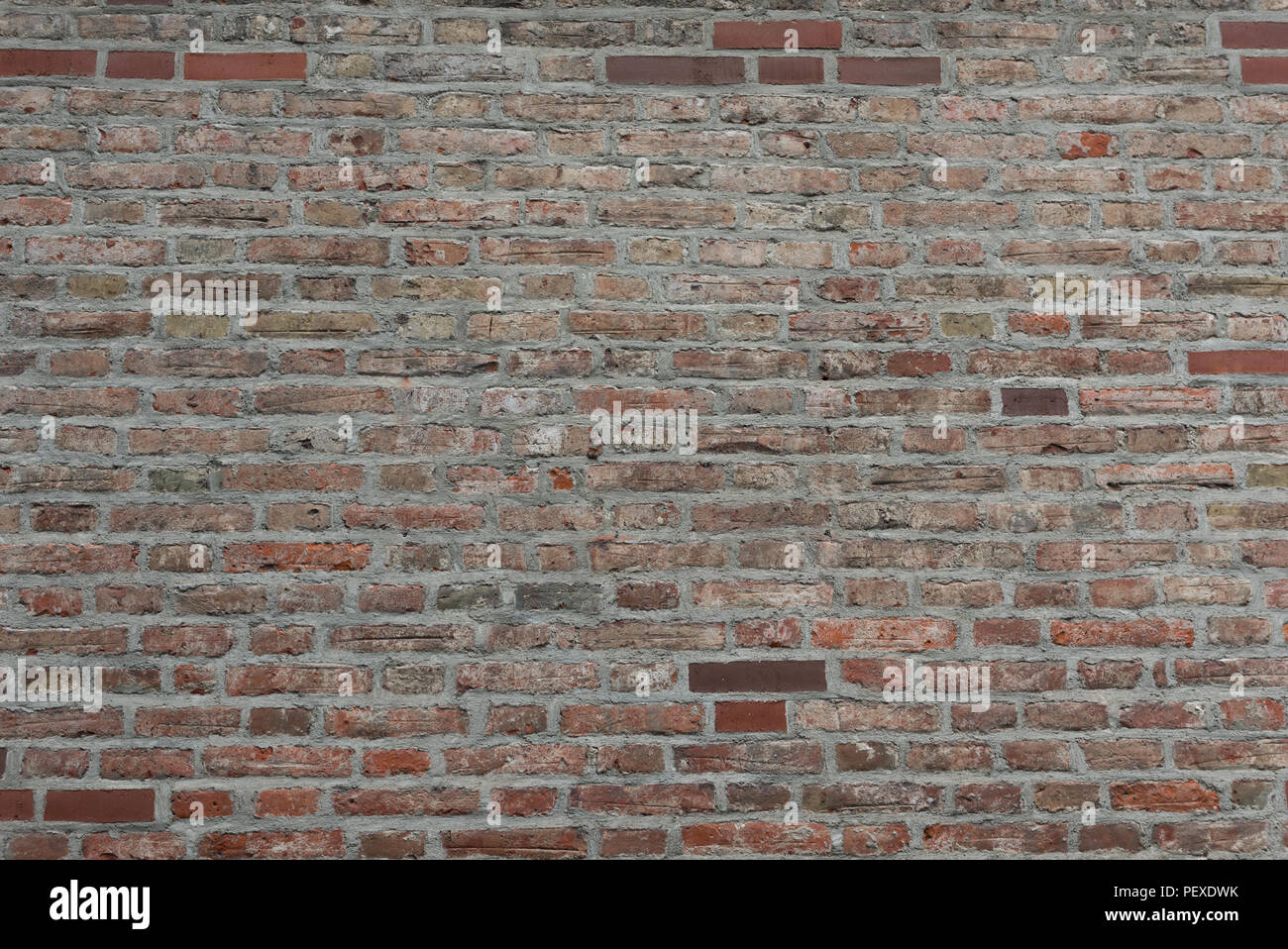 Old Red brick wall as background, wallpaper. Red bricks pattern, texture. Horizontal wide brick wall Stock Photo