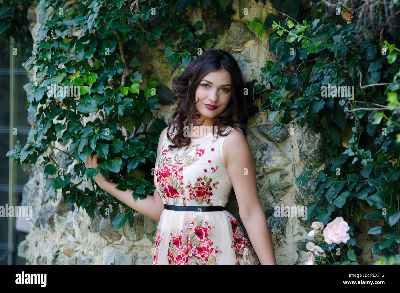 Portrait of a beautiful young girl on nature Stock Photo - Alamy