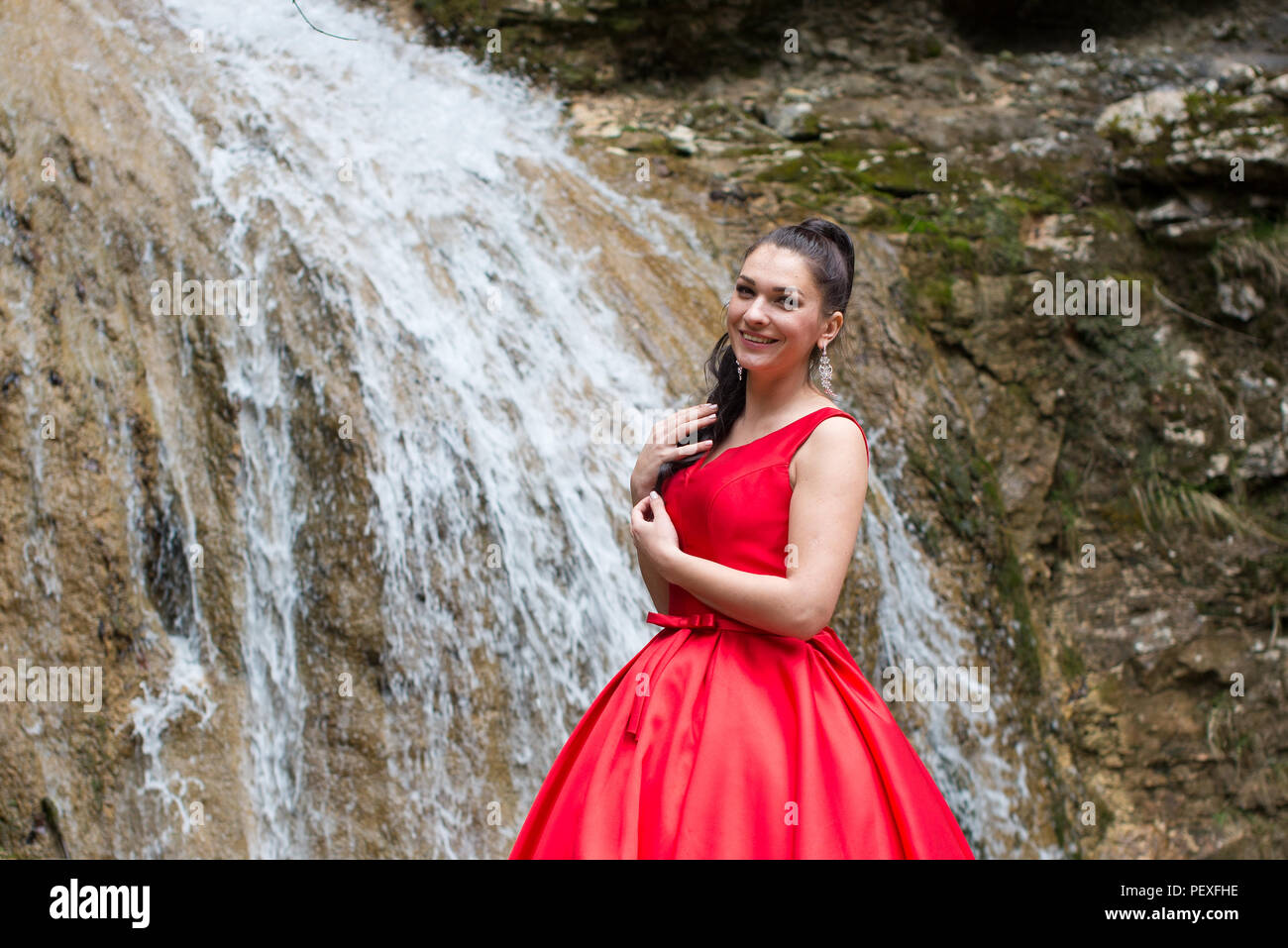 Portrait of a beautiful young girl on nature Stock Photo - Alamy