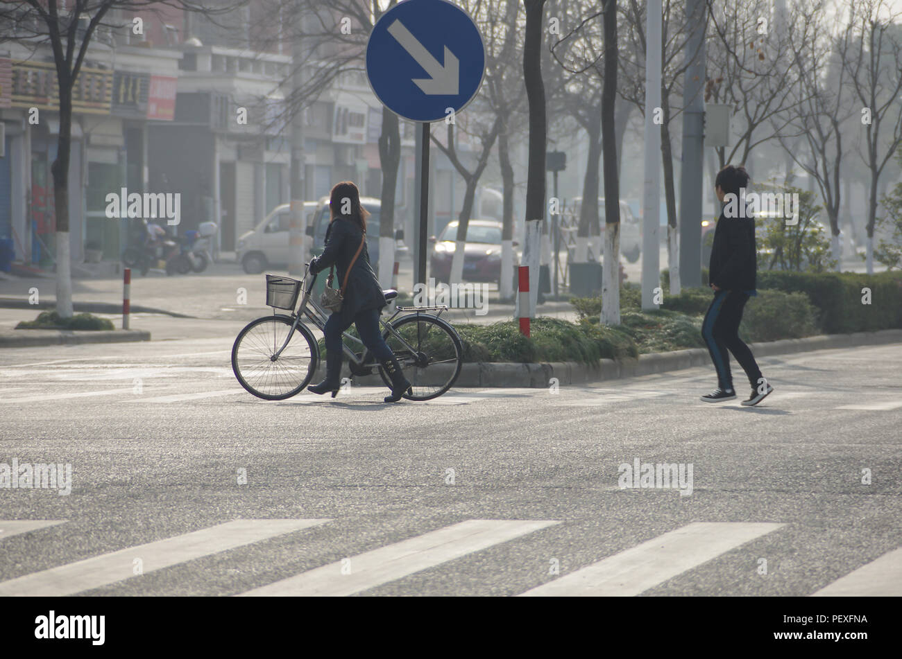 Chinese People are Crossing the Zebra Crosswalk Stock Photo - Alamy