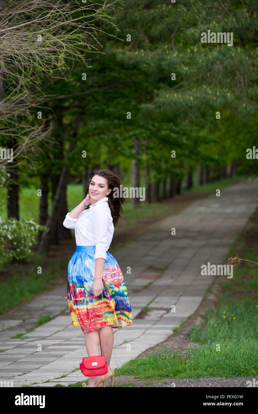 Portrait of a beautiful young girl on nature Stock Photo - Alamy