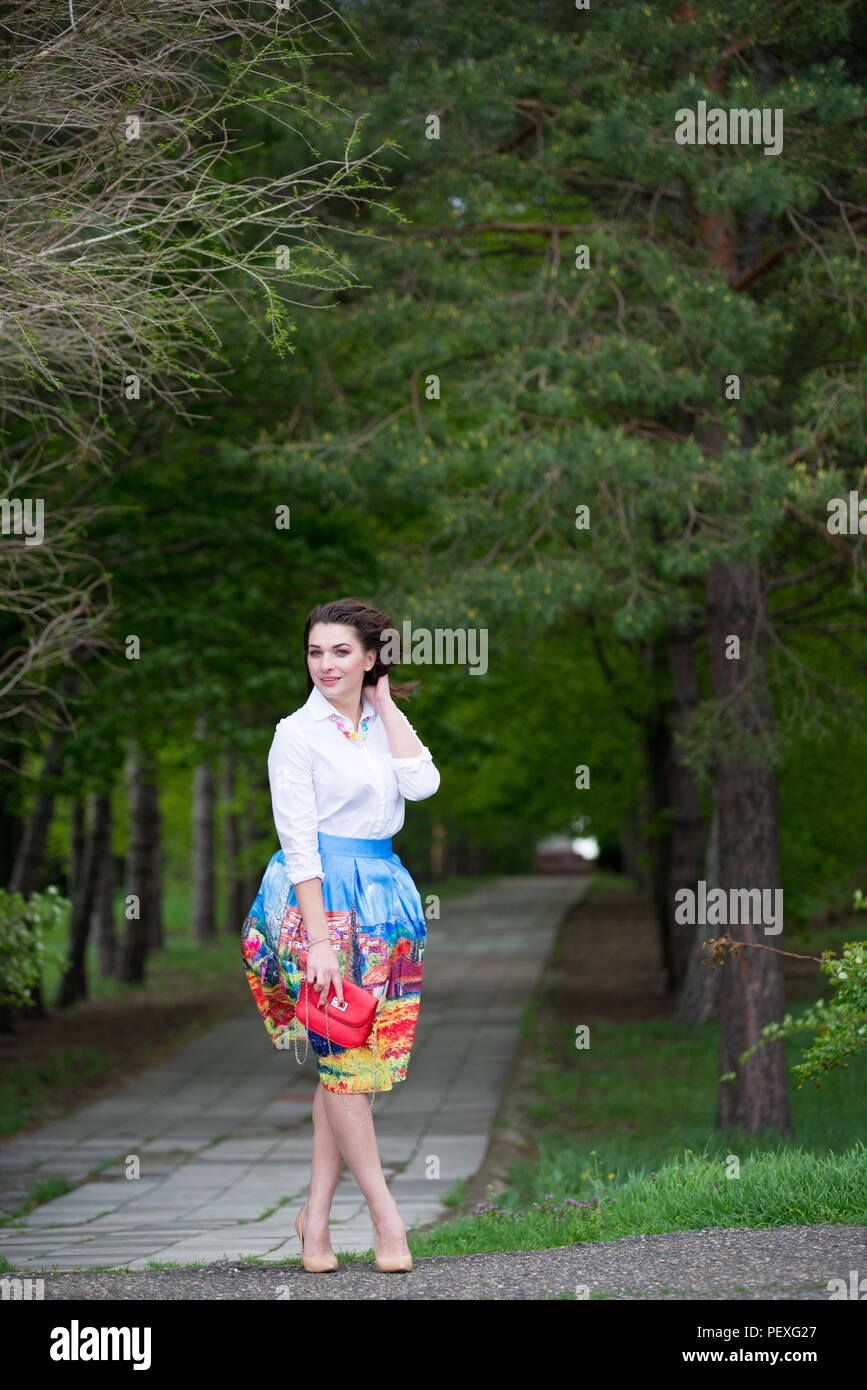 Portrait of a beautiful young girl on nature Stock Photo - Alamy