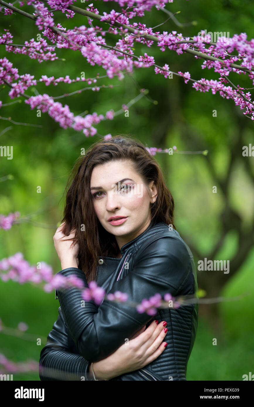 Portrait of a beautiful young girl on nature Stock Photo - Alamy