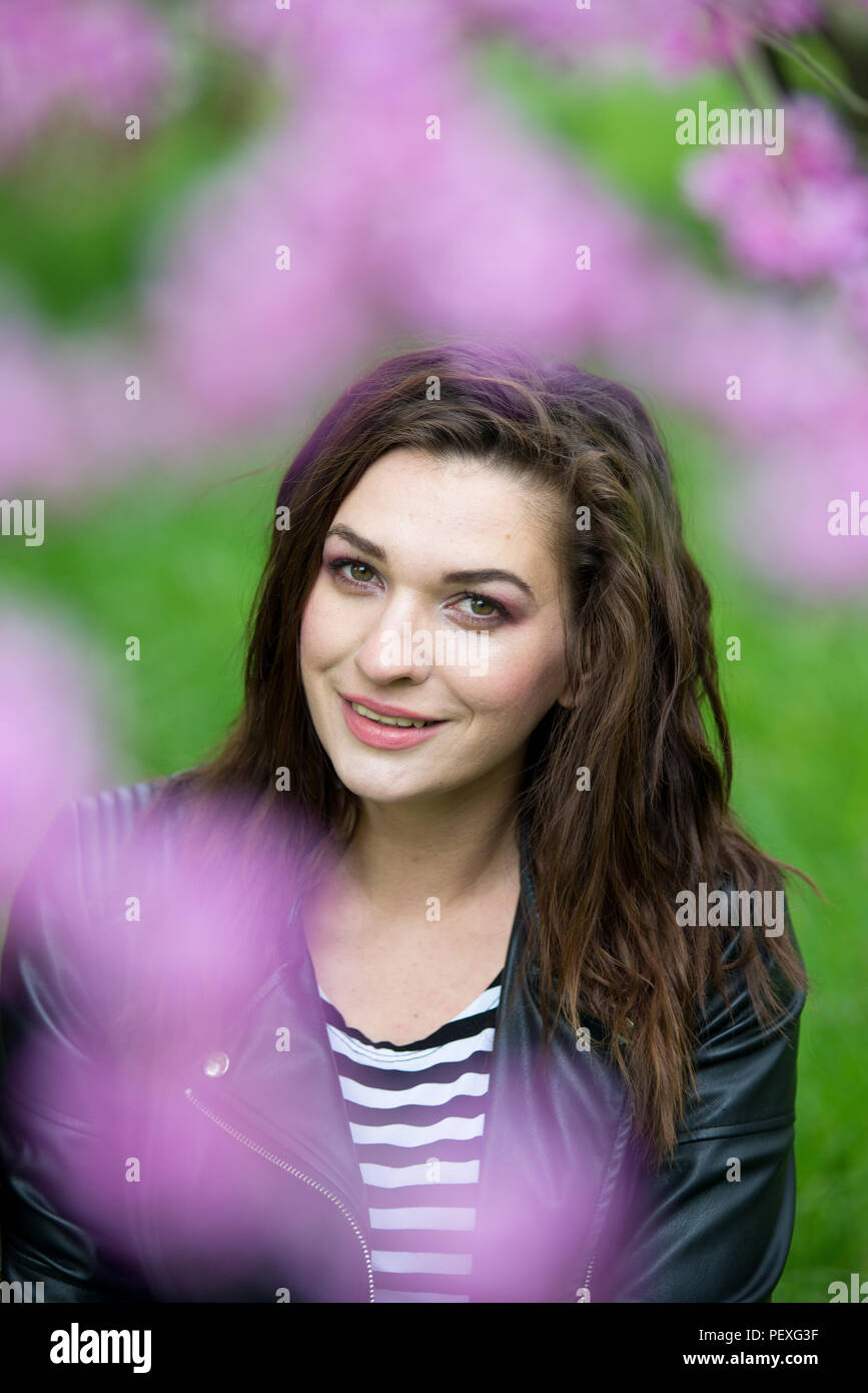 Portrait of a beautiful young girl on nature Stock Photo - Alamy