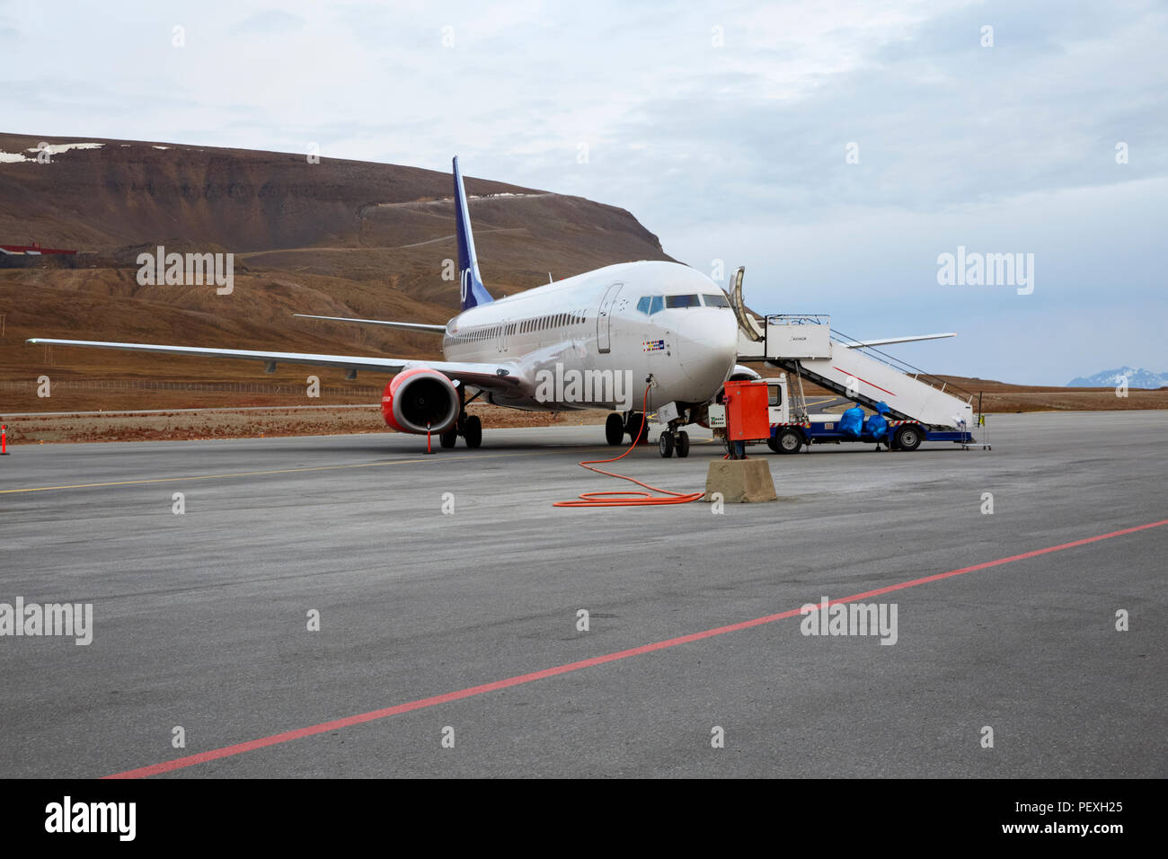 SAS airplane refueling at the Longyearbyen airport Longyearbyen Lufthavn in Svalbard Stock Photo