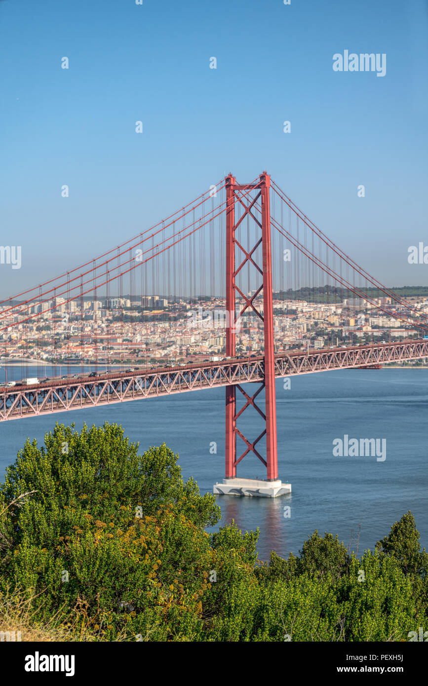 25 De Abril Bridge Is A Suspension Bridge Road Rail That Connects The City Of Lisbon To The City Of Almada In Portugal The Bridge Crosses The Estuar Stock Photo Alamy