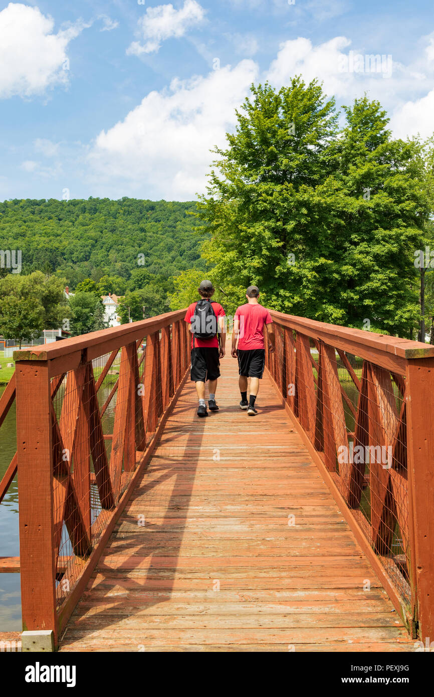 SMETHPORT, PA, USA11 AUGUST Two boys cross the footbridge in Hamlin