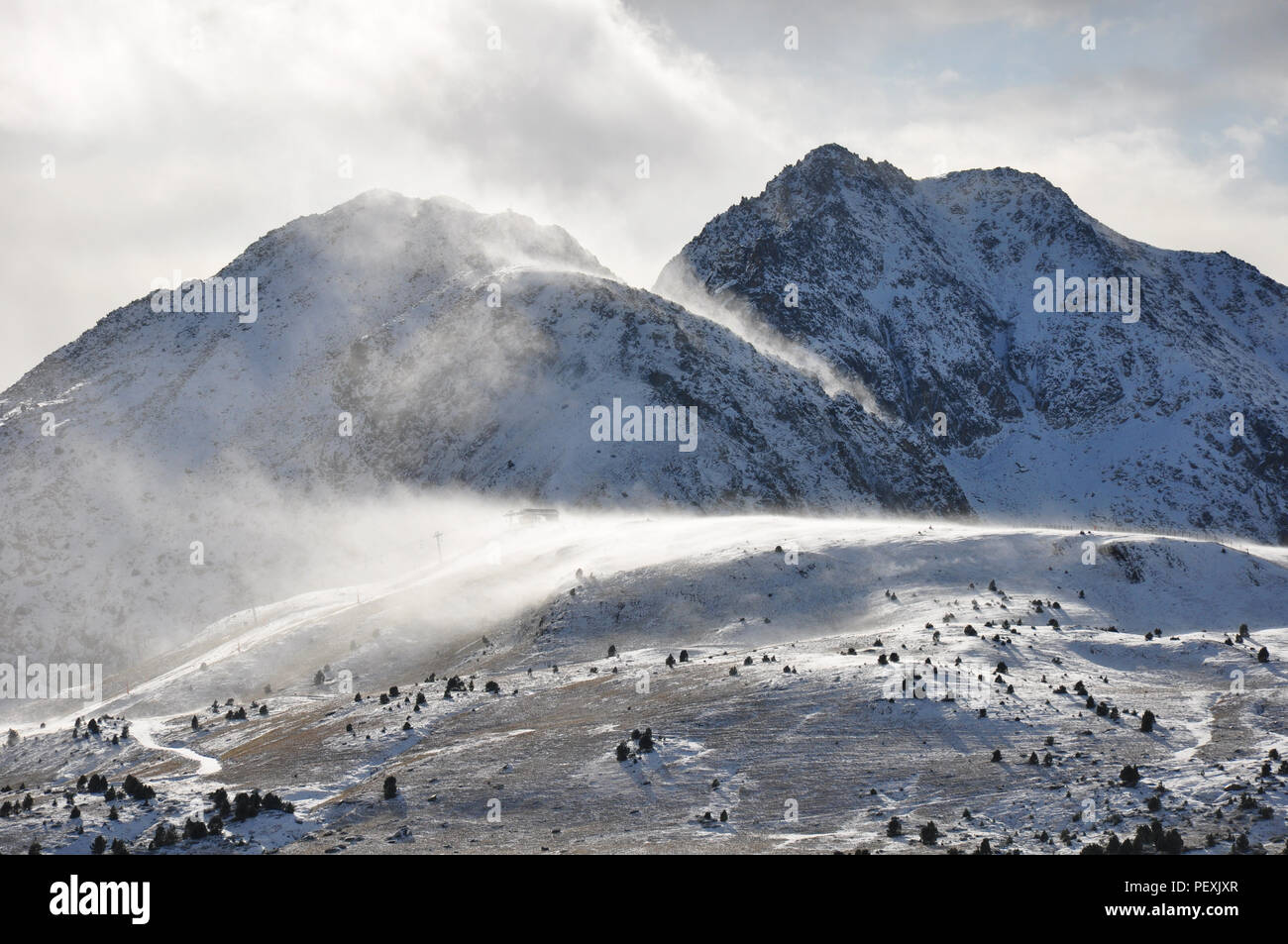 Snowed mountains of Andorra in winter near Pas de la Casa Stock Photo
