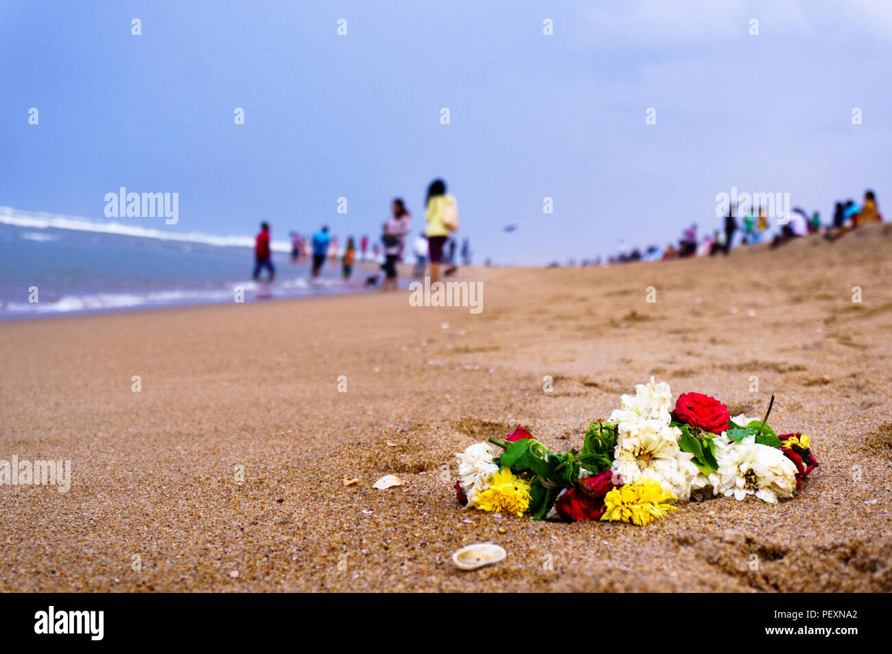 garland of flowers on a beach in chennai Stock Photo Alamy