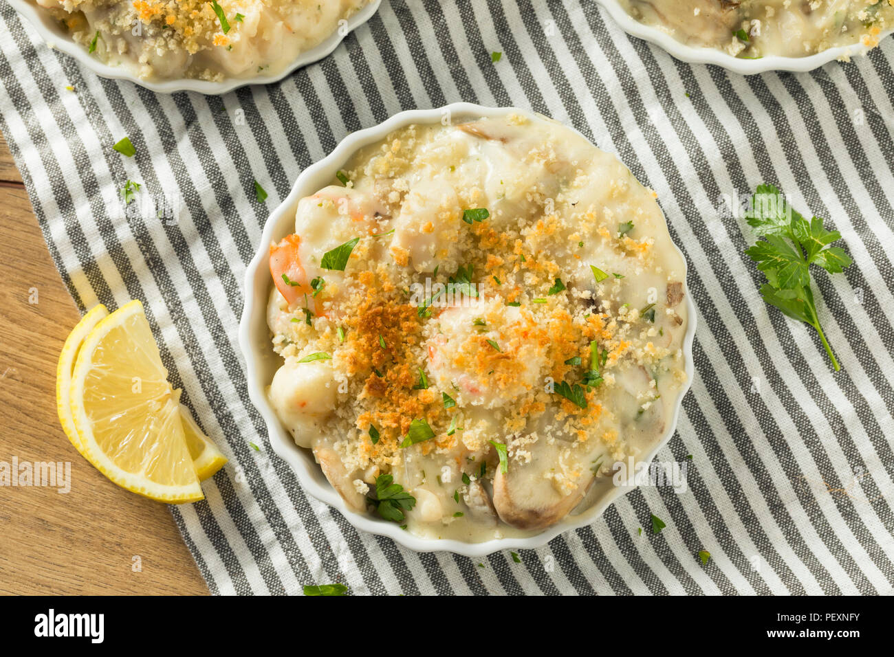 Baked Coquilles St Jacques Scallops and Shirmp Appetizer Stock Photo