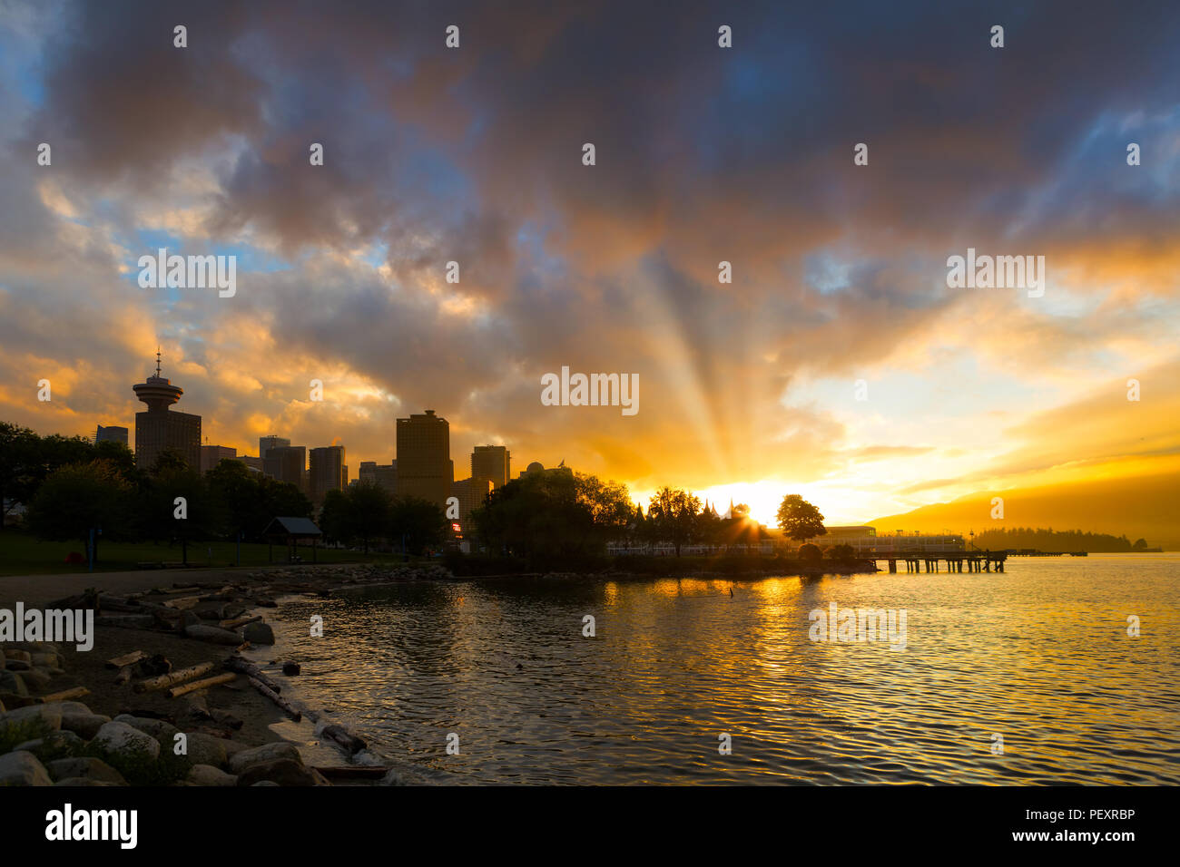 Sunset over Vancouver British Columbia Canada city skyline by Crab Park at Portside Stock Photo