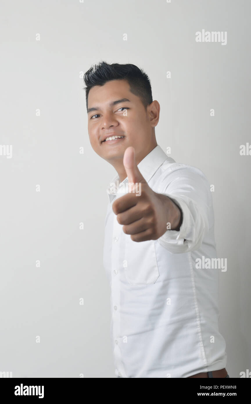 asian male thumbs up Stock Photo - Alamy
