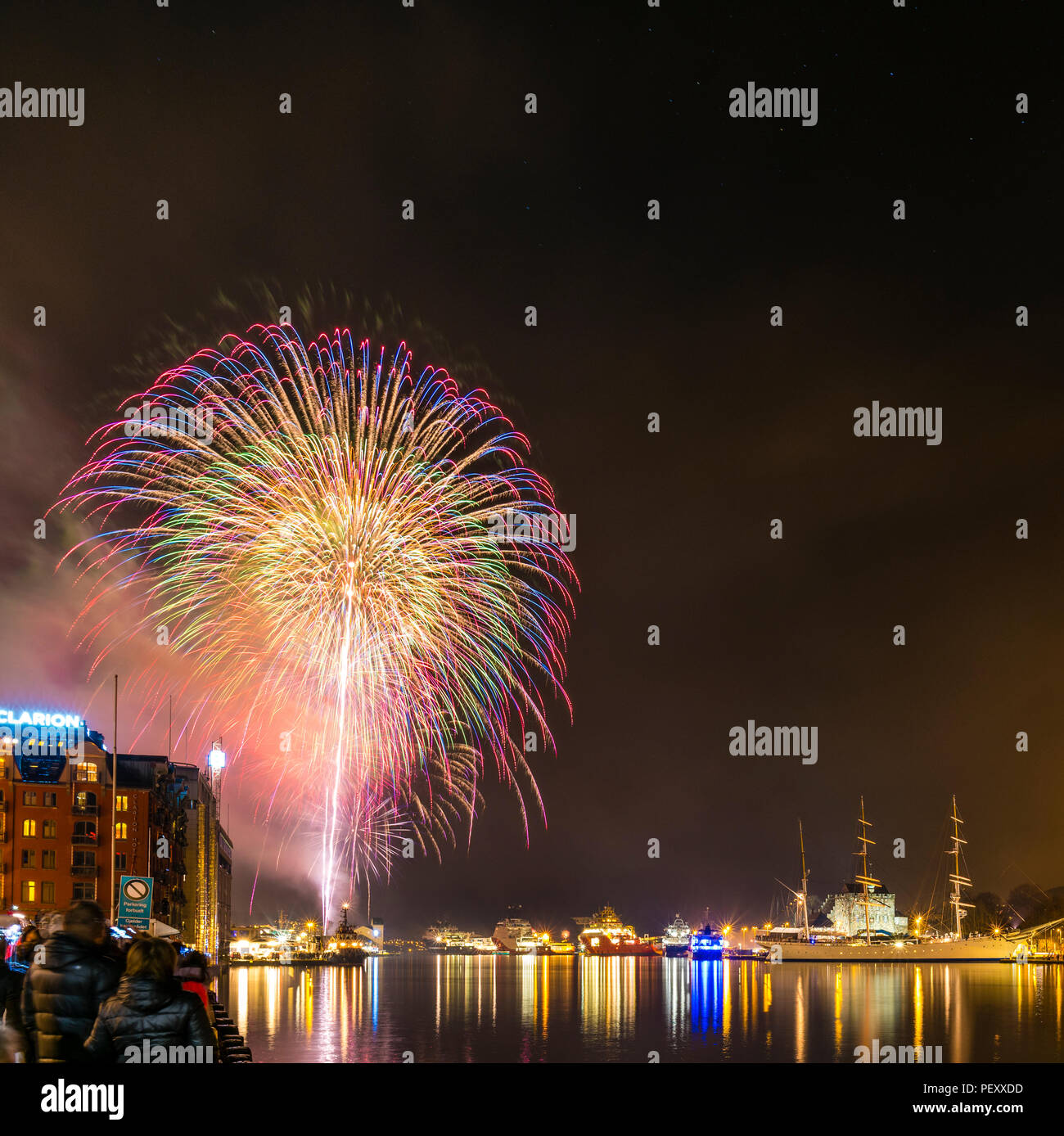 Fireworks in Bergen, Norway, at New years eve celebration. Stock Photo