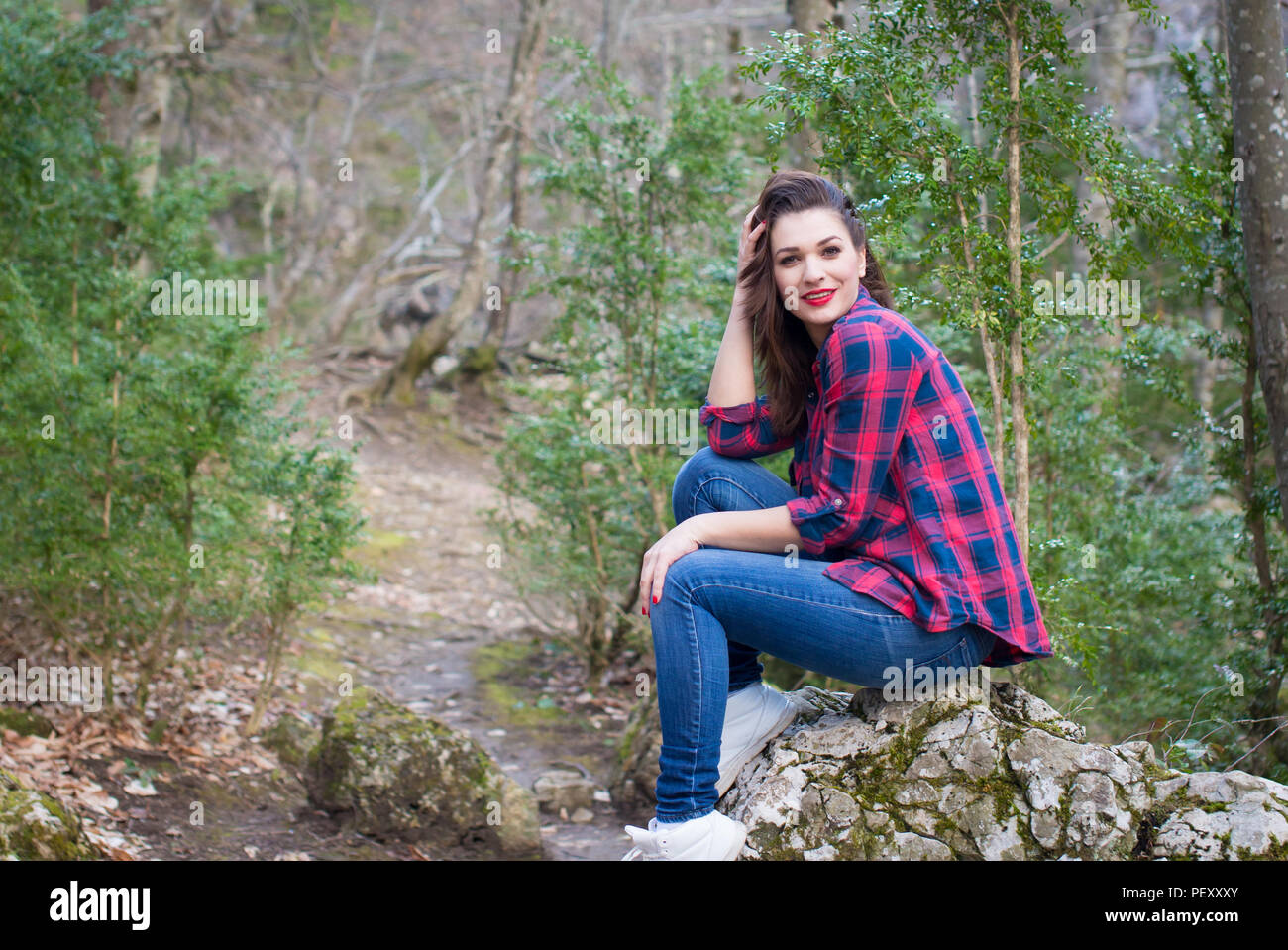 Portrait of a beautiful young girl on nature Stock Photo - Alamy