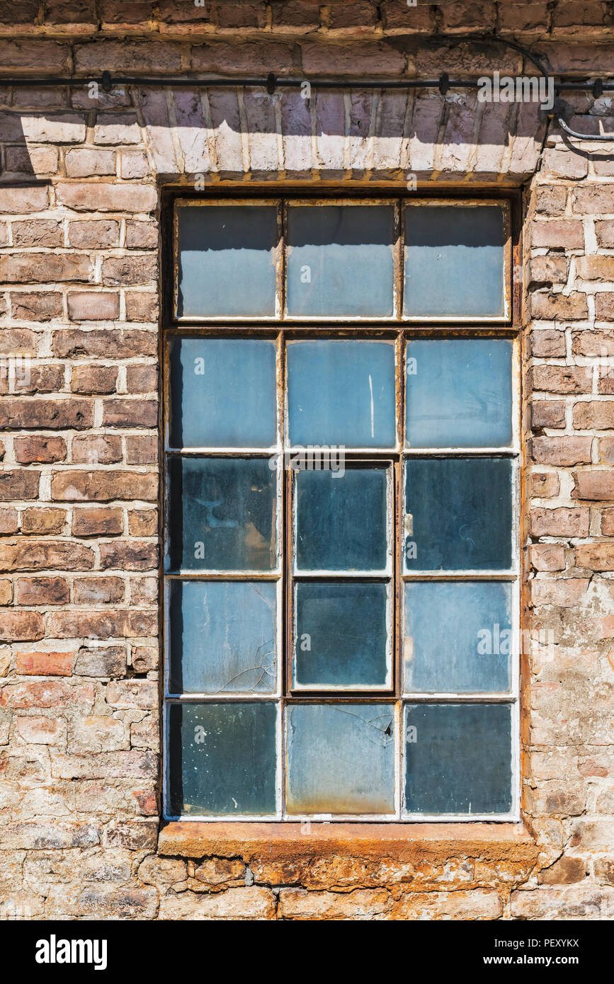 Window at an old factory building in Brandenburg, Germany, Europe Stock Photo
