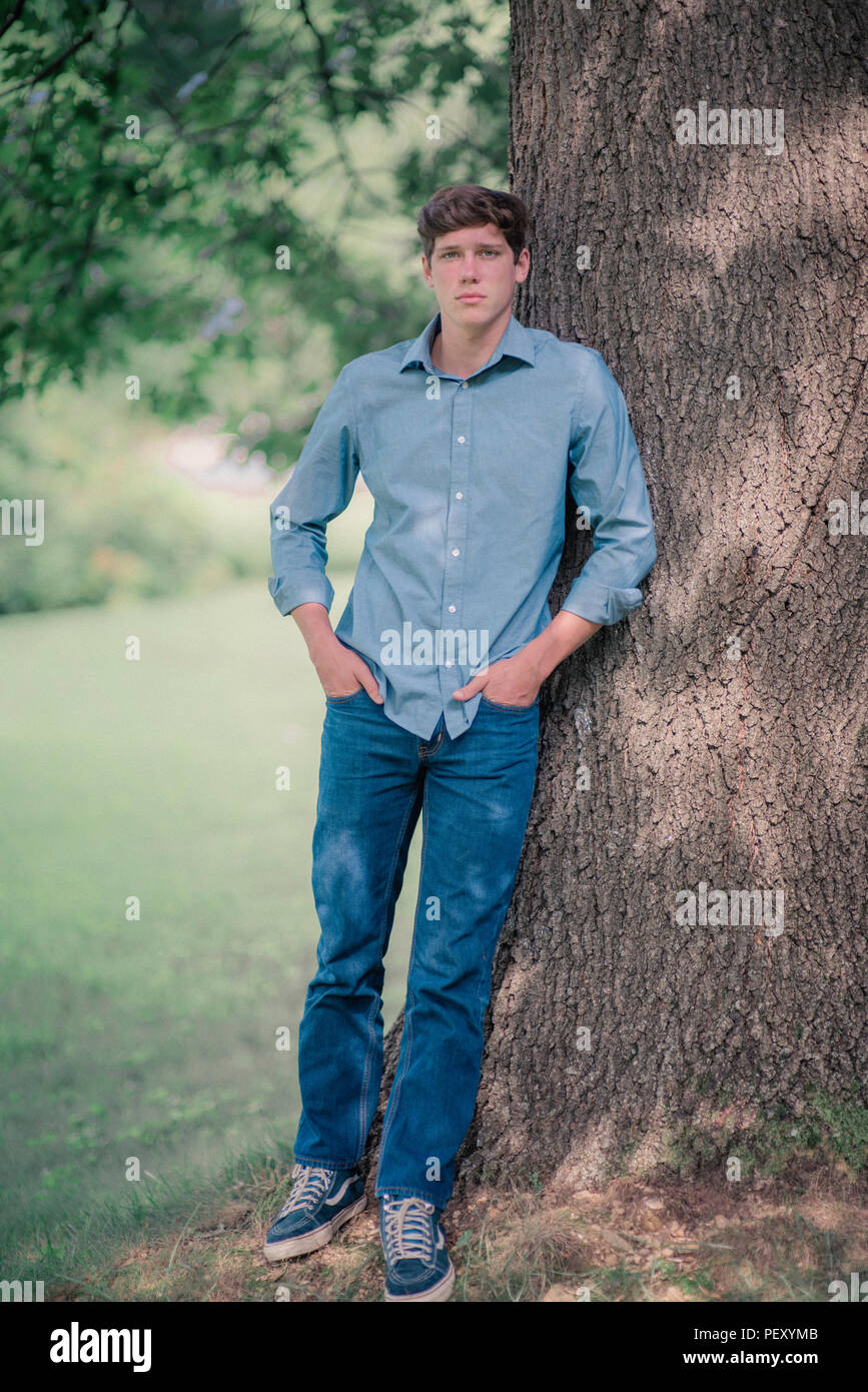 Teen boy wearing jeans hi-res stock photography and images - Alamy