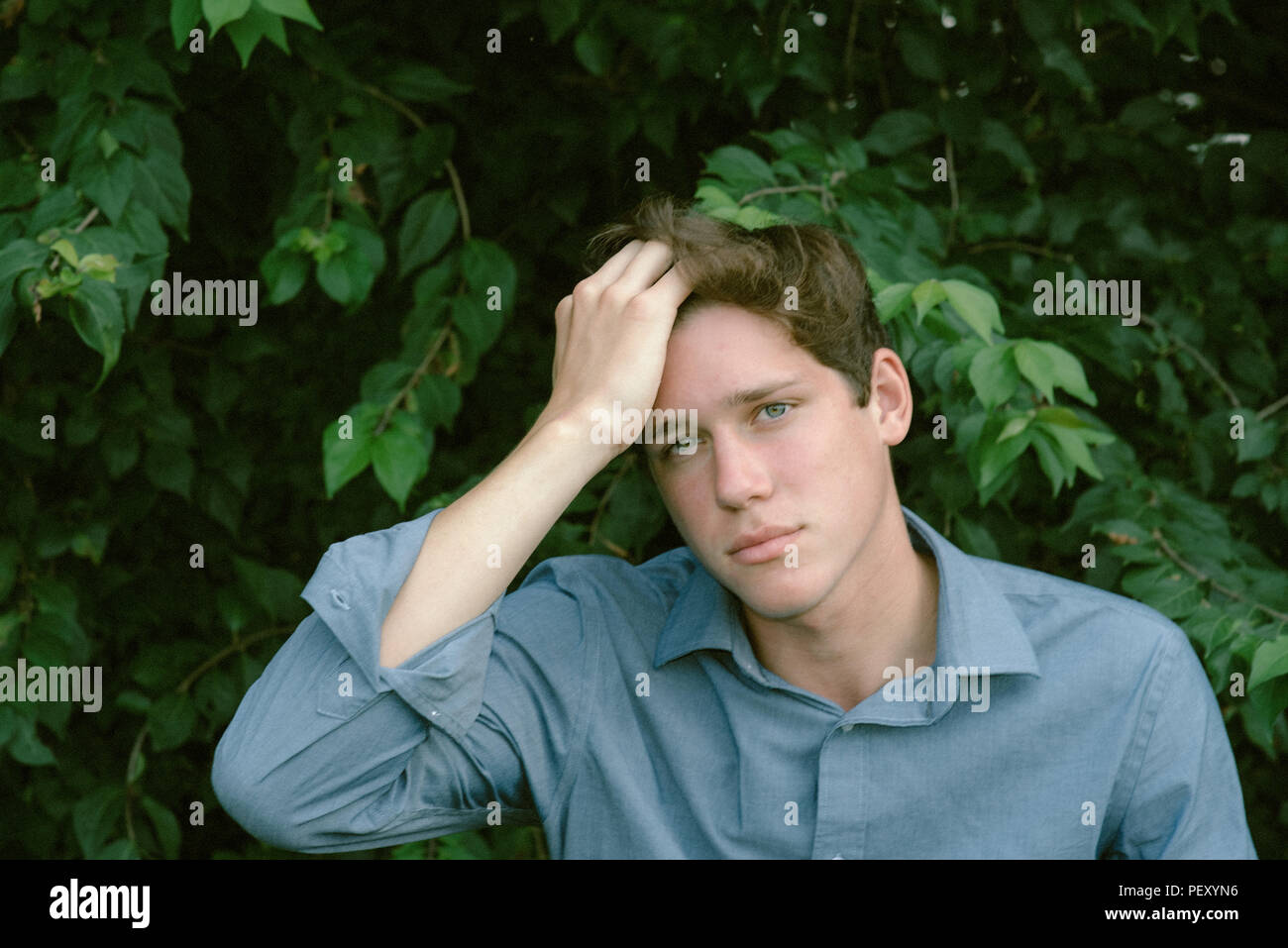 Wholesome teenage boy outdoors Stock Photo
