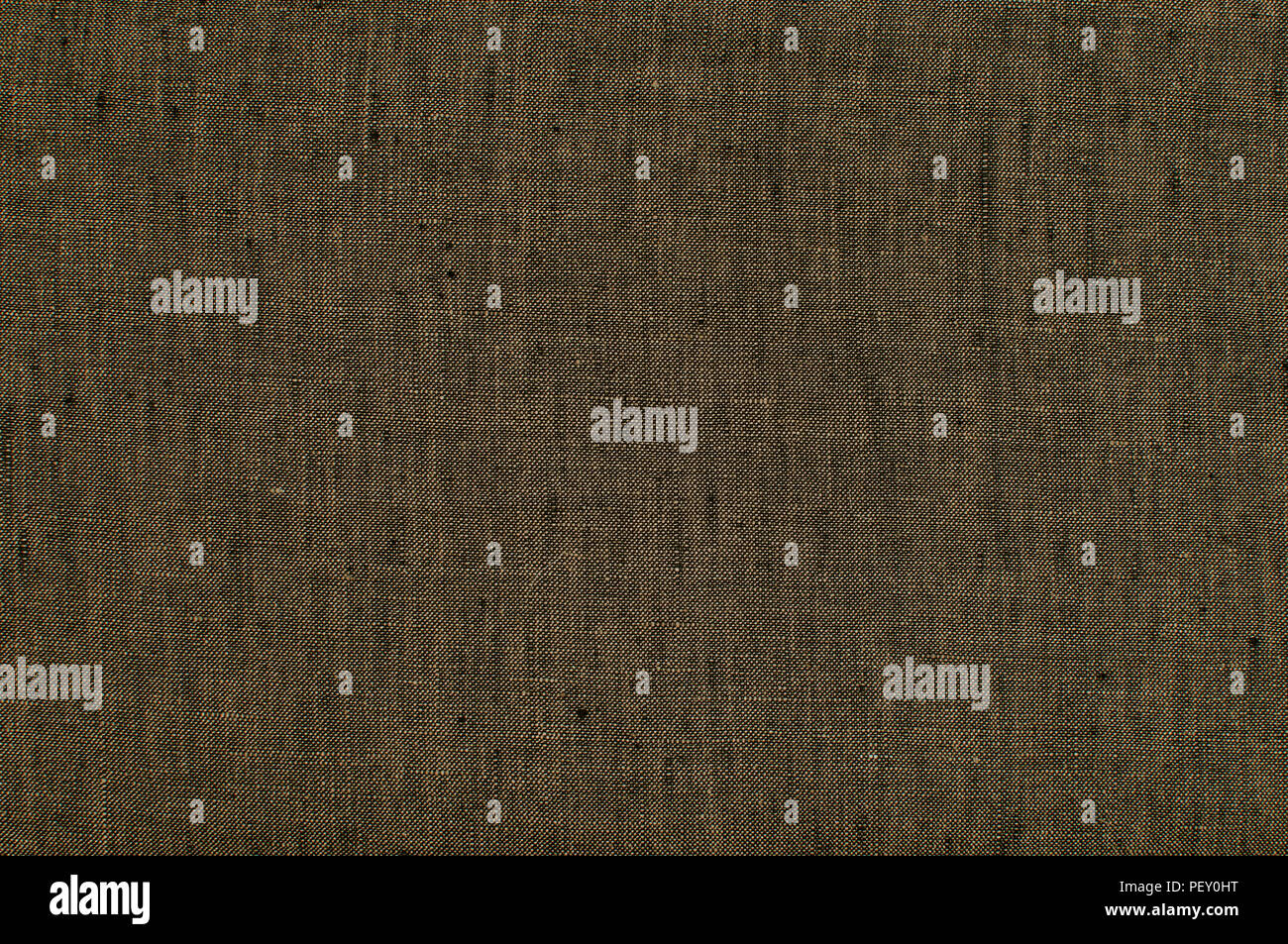 Dark brown linen fabric texture surface closeup as textile background
