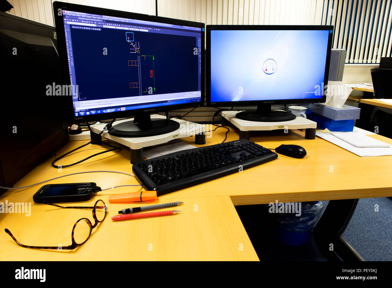 business desk office interior with mouse and keyboard to computer