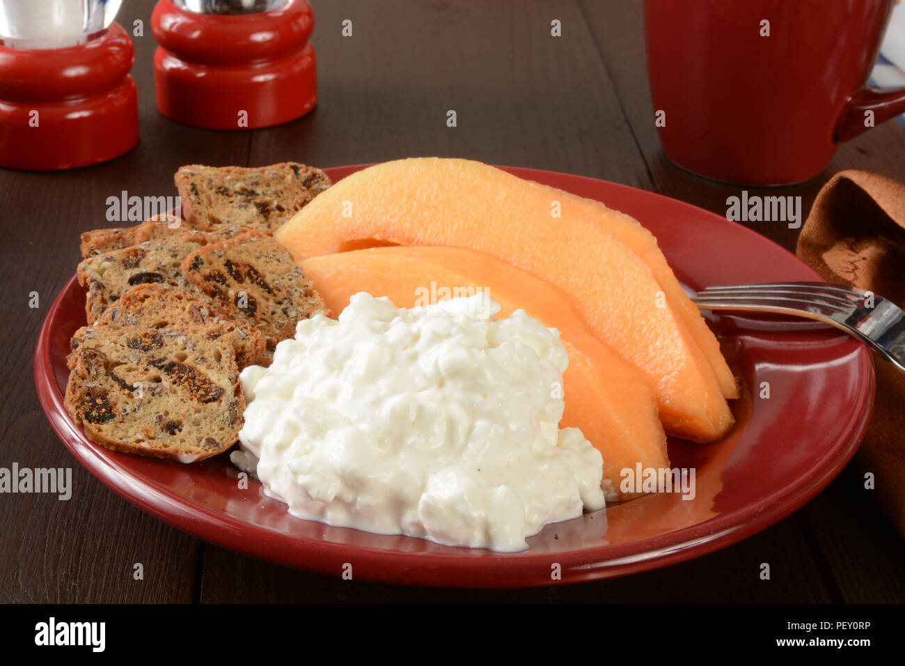 Cantaloupe And Cottage Cheese With Fruit And Nut Infused Crackers