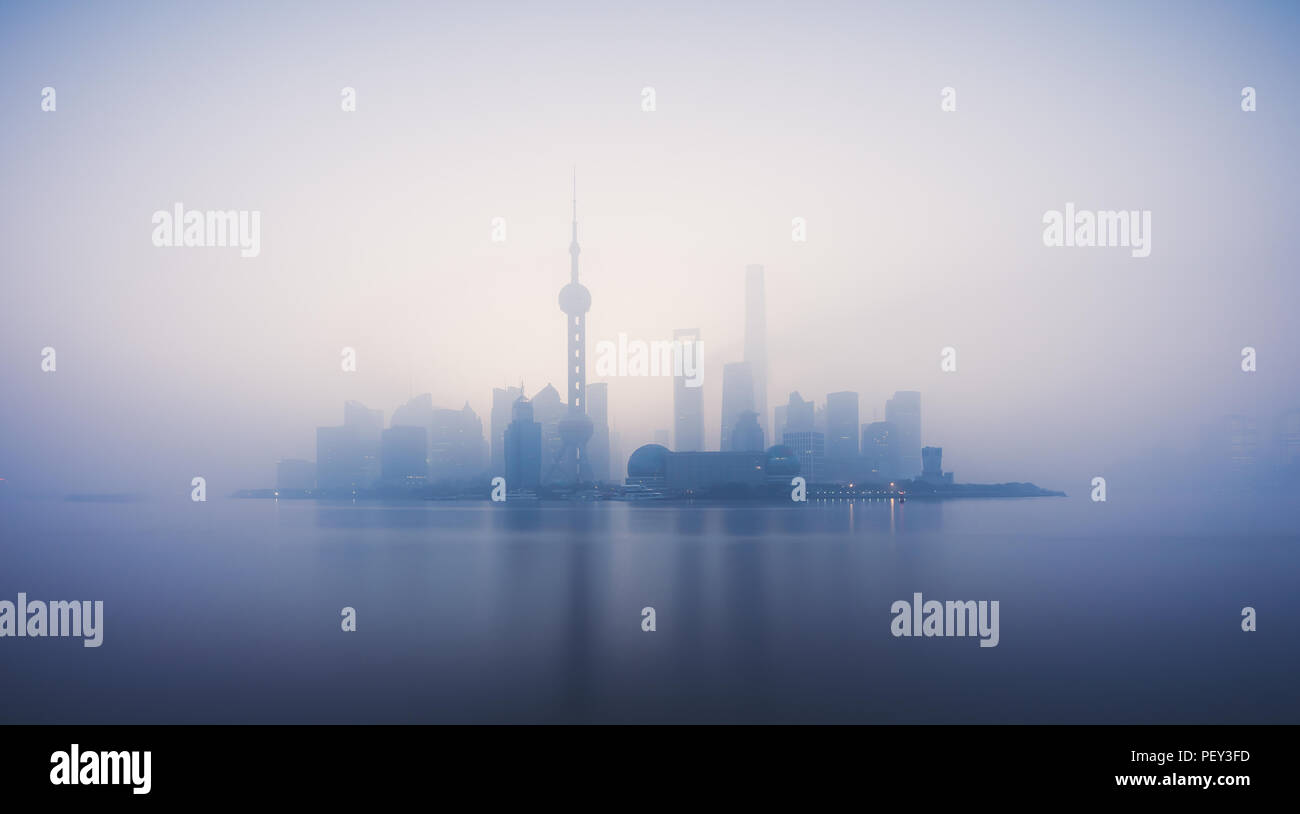 Skyline of Shanghai in China during a polluted and foggy morning , smog , Stock Photo