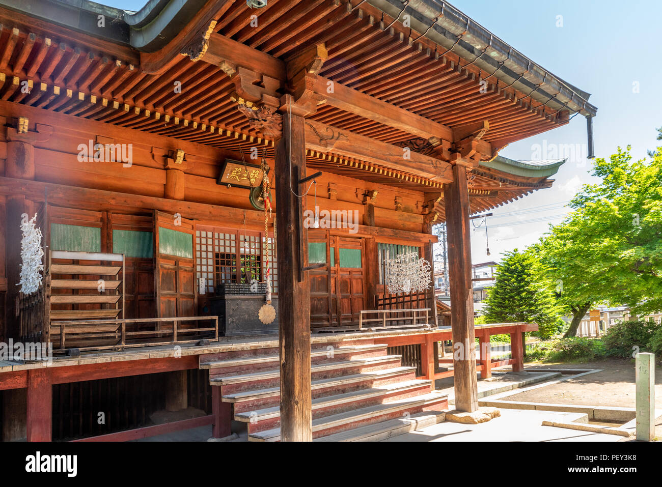 In front of a Japanese style temple Stock Photo - Alamy