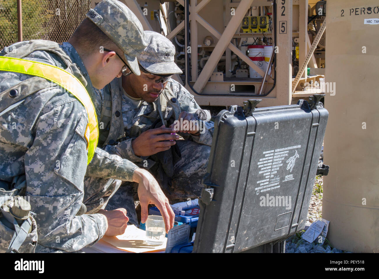Spc. Fearon Williams and Pvt. Jeremey Howard, both water treatment