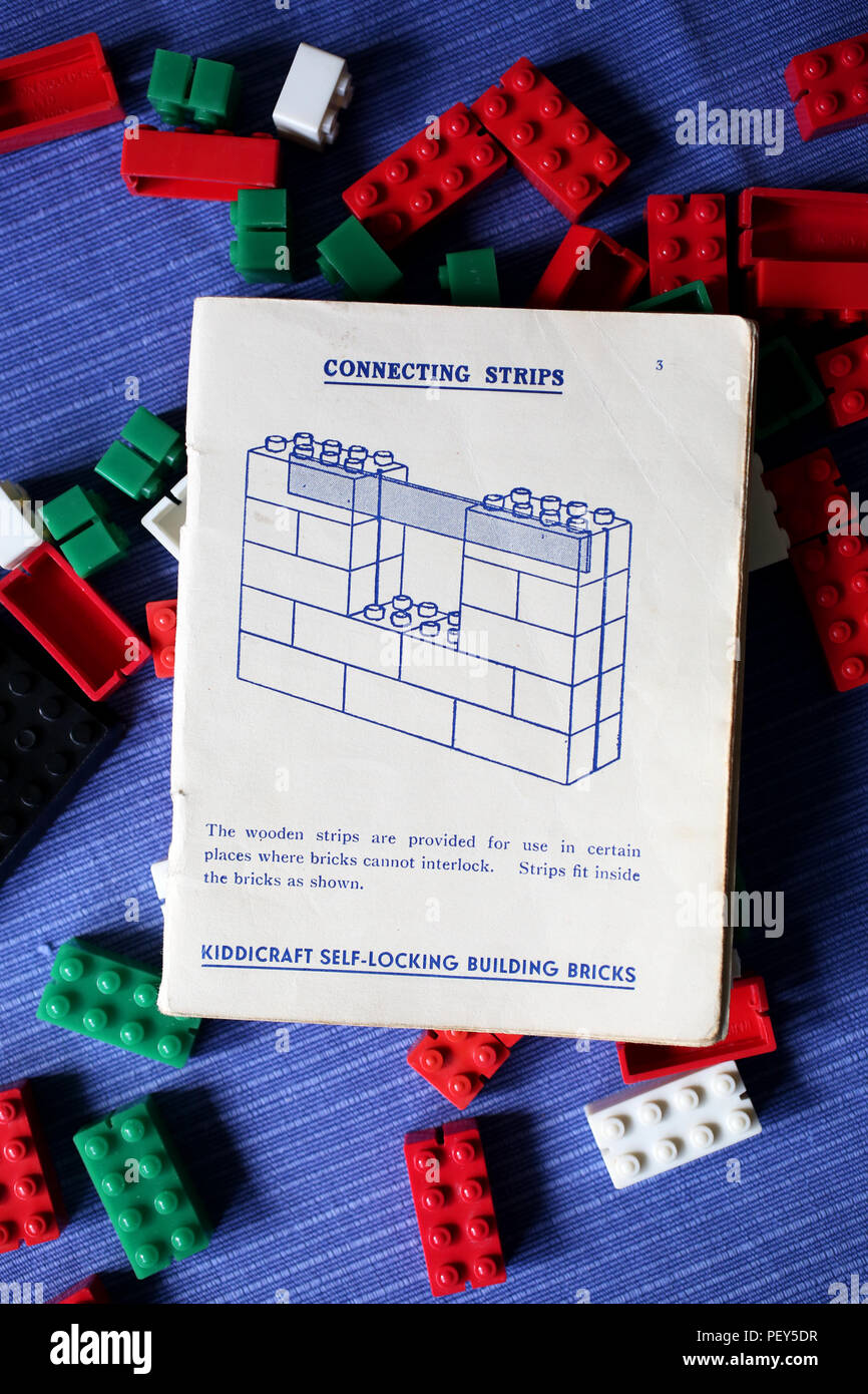 A collection of Kiddicraft brick toys from the 1940s with instructions and picture cards and Hilary Page Design inside. Sussex, UK. Stock Photo