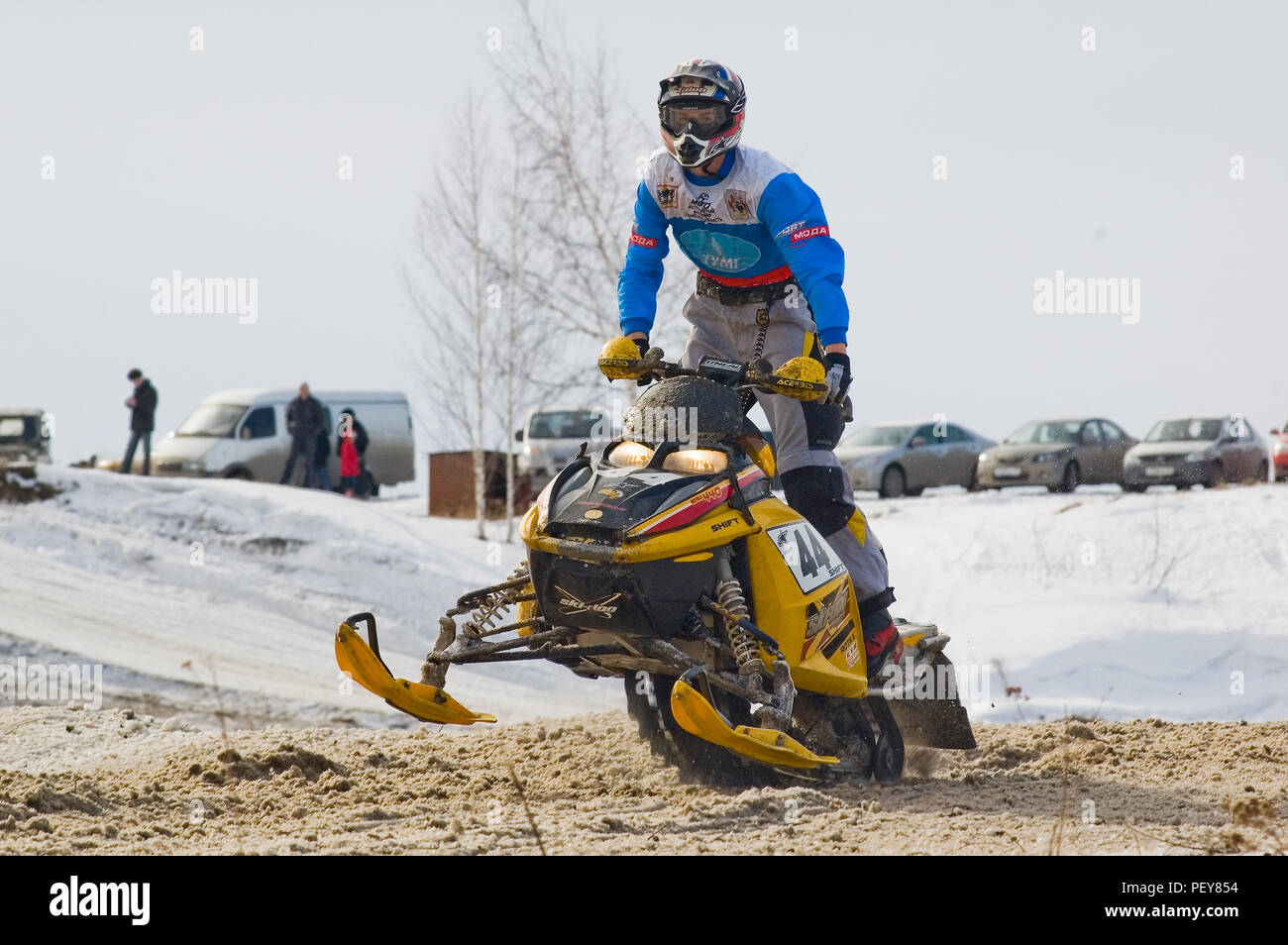 Man on snowmobile in winter hi-res stock photography and images - Alamy