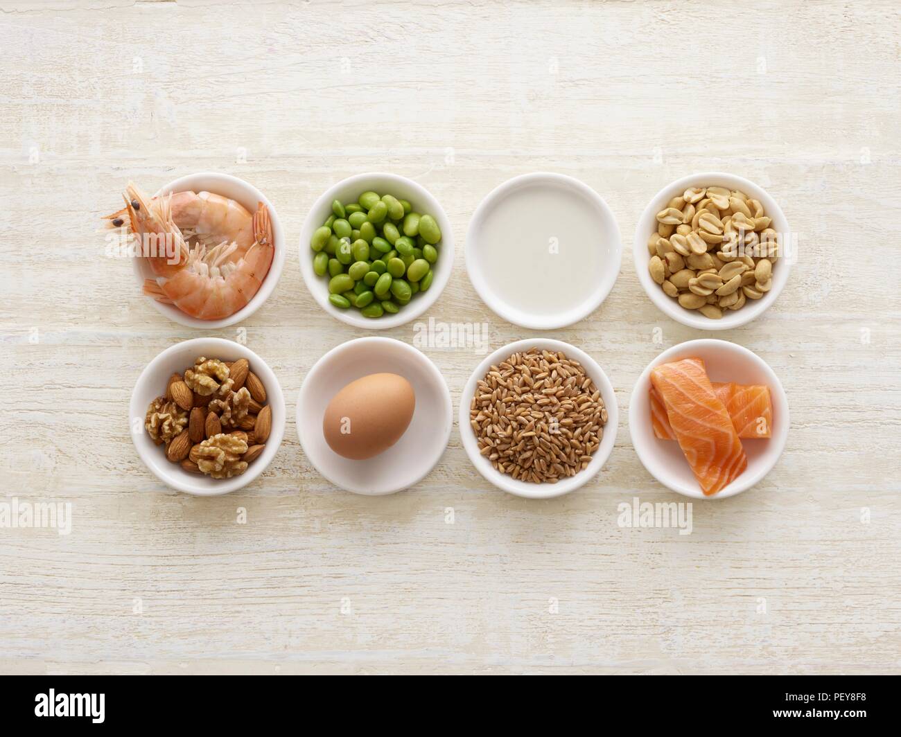 Allergenic foods in bowls, still life. Stock Photo