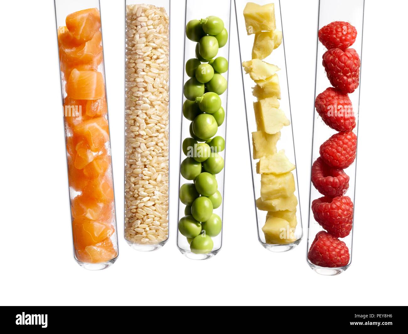 Foods in test tubes, studio shot. Stock Photo